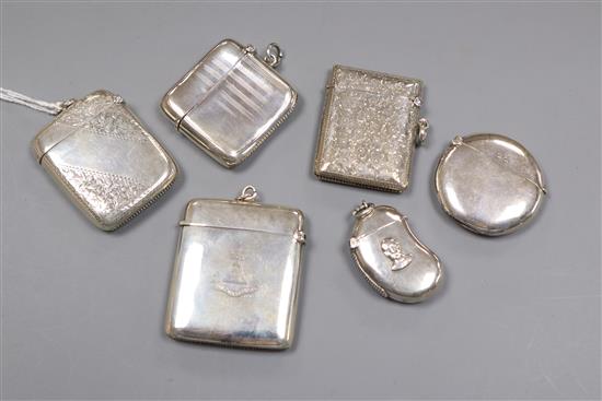 Six assorted early 20th century silver vesta cases including moon shape and kidney shape with bust of Lord Roberts?, largest 56mm